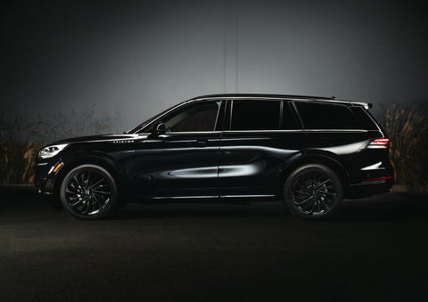 A 2024 Lincoln Aviator® SUV is shown in the Infinite Black exterior color | Pinnacle Lincoln in Nicholasville KY