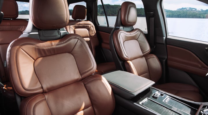 The front row's Perfect Position Seats in a 2024 Lincoln Aviator® Reserve model with Ebony Roast interior | Pinnacle Lincoln in Nicholasville KY