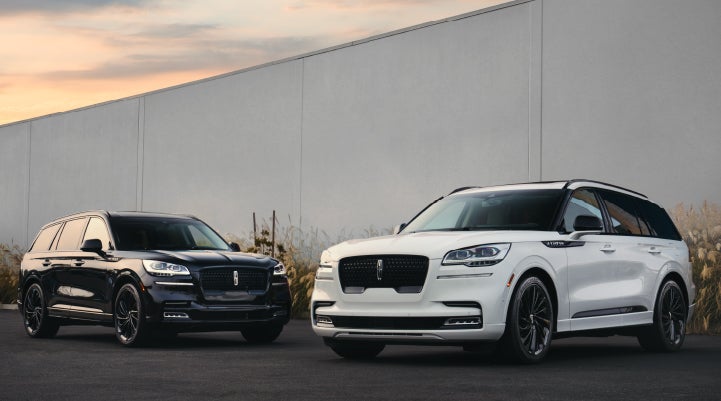 Two Lincoln Aviator® SUVs are shown with the available Jet Appearance Package | Pinnacle Lincoln in Nicholasville KY