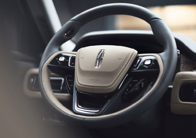 The intuitively placed controls of the steering wheel on a 2024 Lincoln Aviator® SUV | Pinnacle Lincoln in Nicholasville KY
