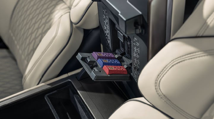 Digital Scent cartridges are shown in the diffuser located in the center arm rest. | Pinnacle Lincoln in Nicholasville KY